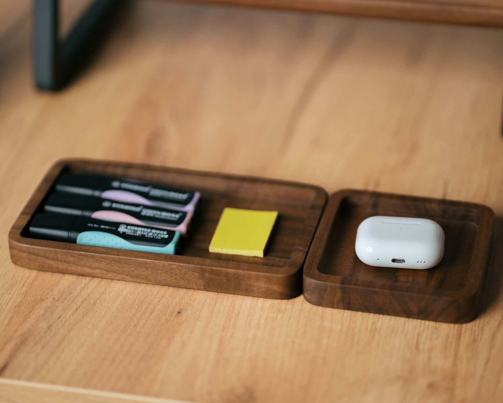 Elegant Tray and Pots collection showcasing a wooden tray with markers and AirPods on a desk.