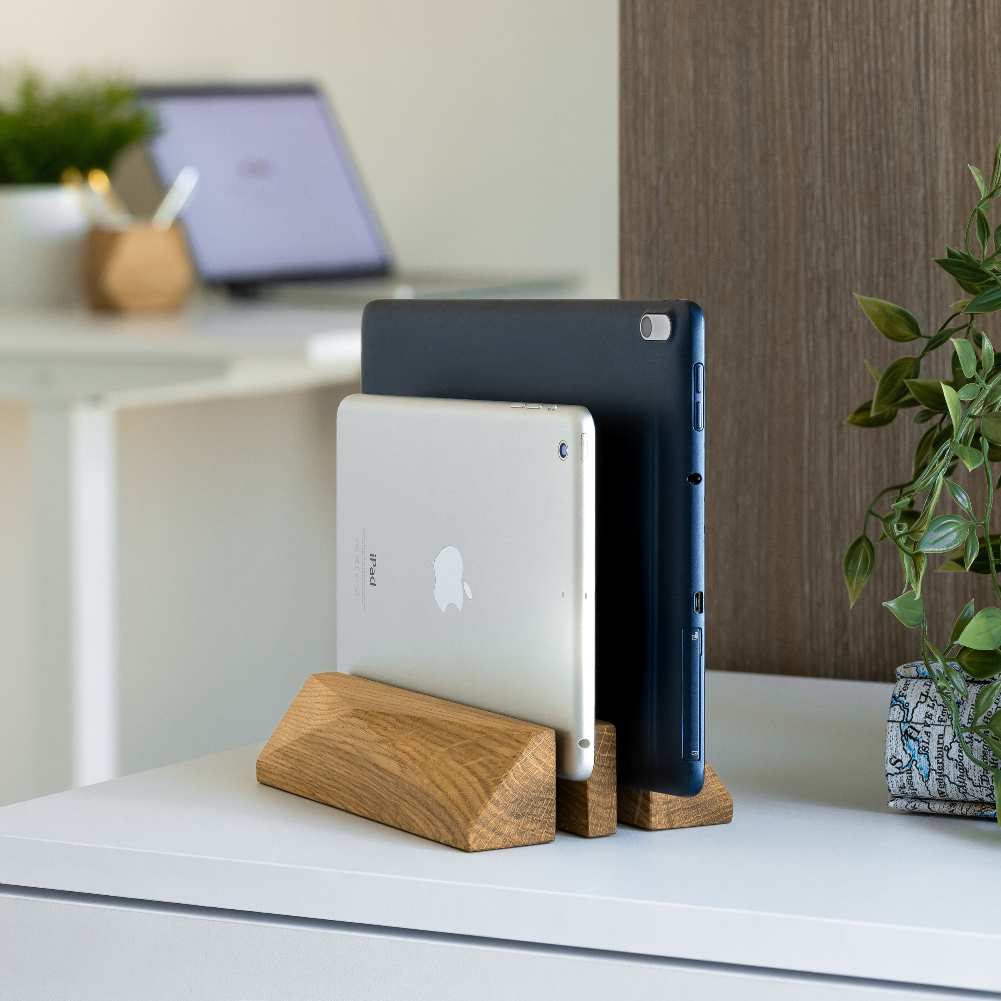 Dual Laptop Dock - Oak holding two devices in a minimalist workspace, enhancing organization and style.