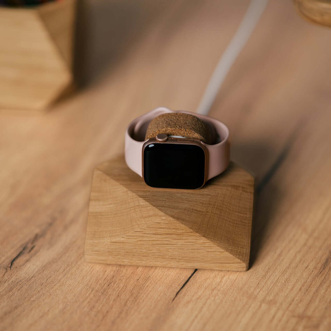 Apple Watch charging stand in oak, showcasing stylish and functional design for easy charging.