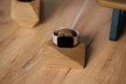 Apple Watch charging stand in oak, showcasing stylish and functional design for easy charging.