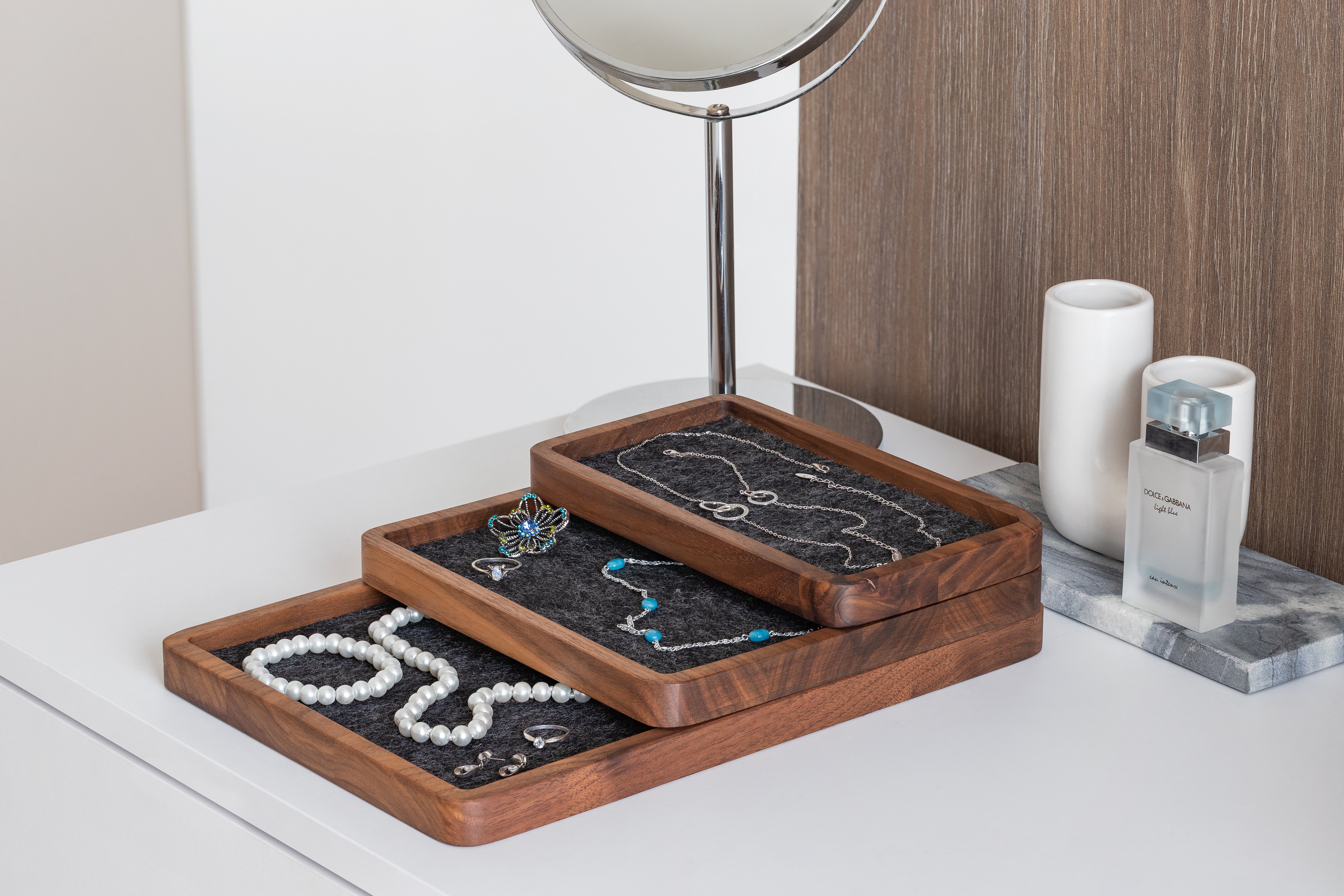 Catch All Tray showcasing jewelry organization on a desk with natural wooden finish.