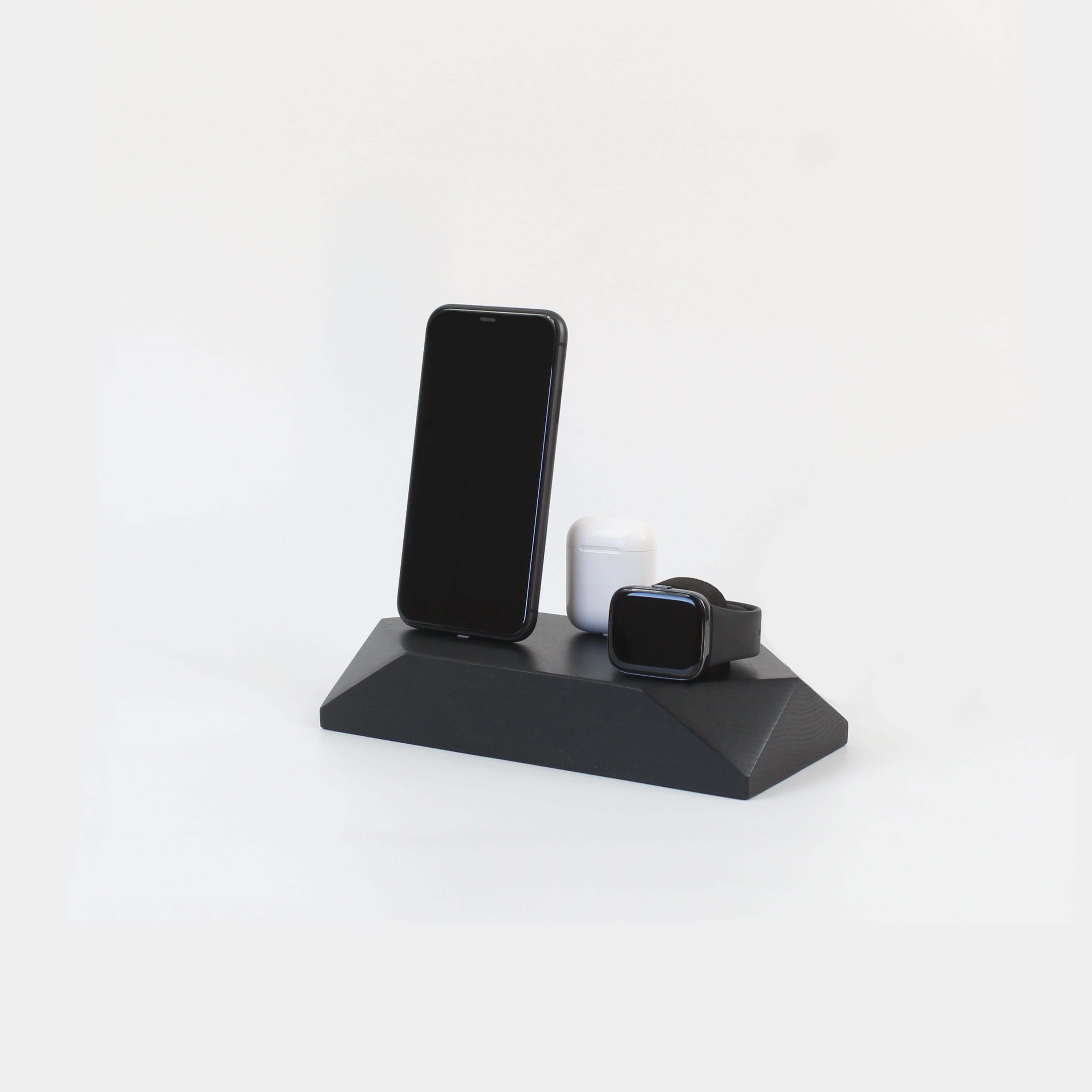 Triple Docking Station in Black Oak, designed for two smartphones and an Apple Watch, enhancing workspace organization.