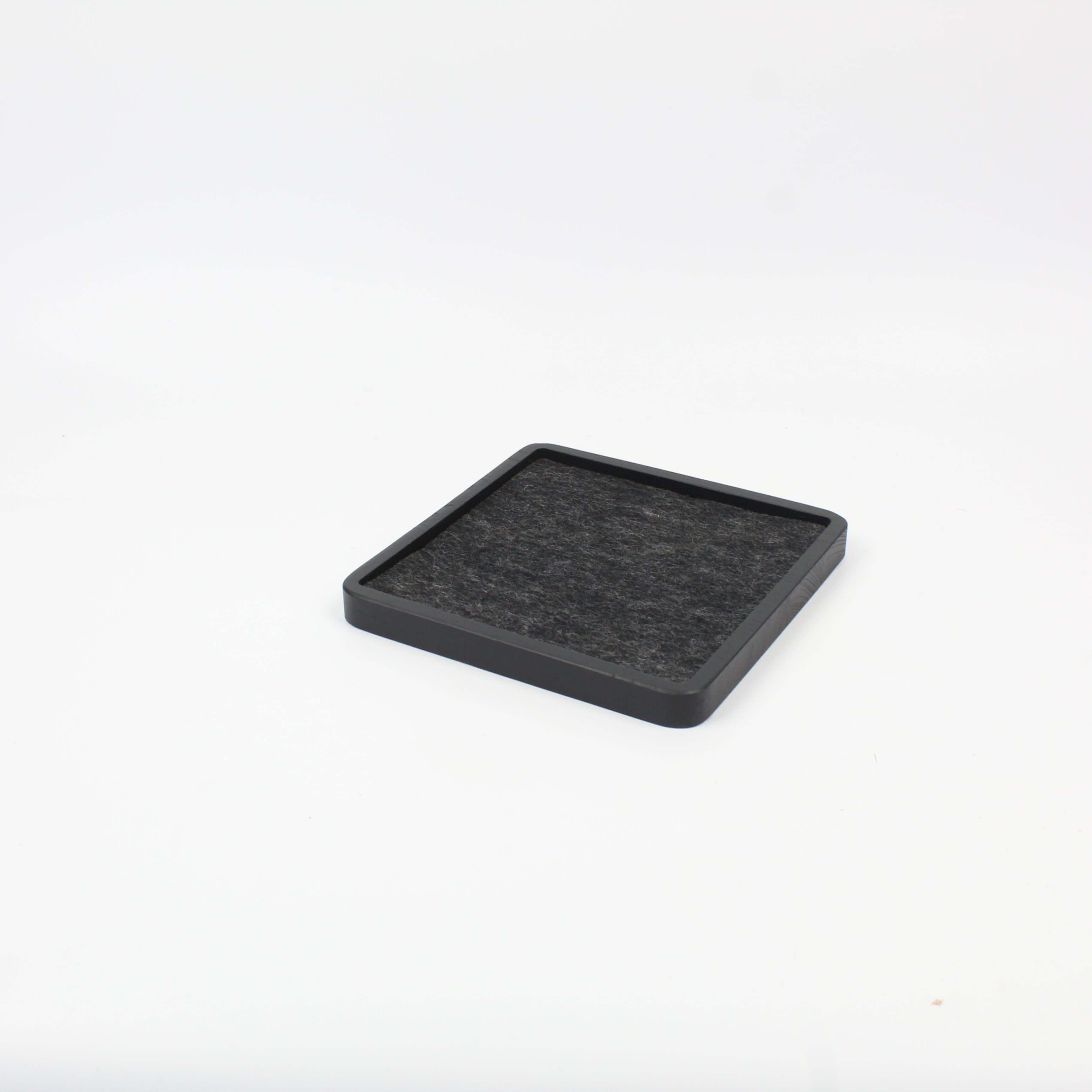 Black oak square catch all tray for organizing desk accessories and essentials, ideal for a tidy workspace.