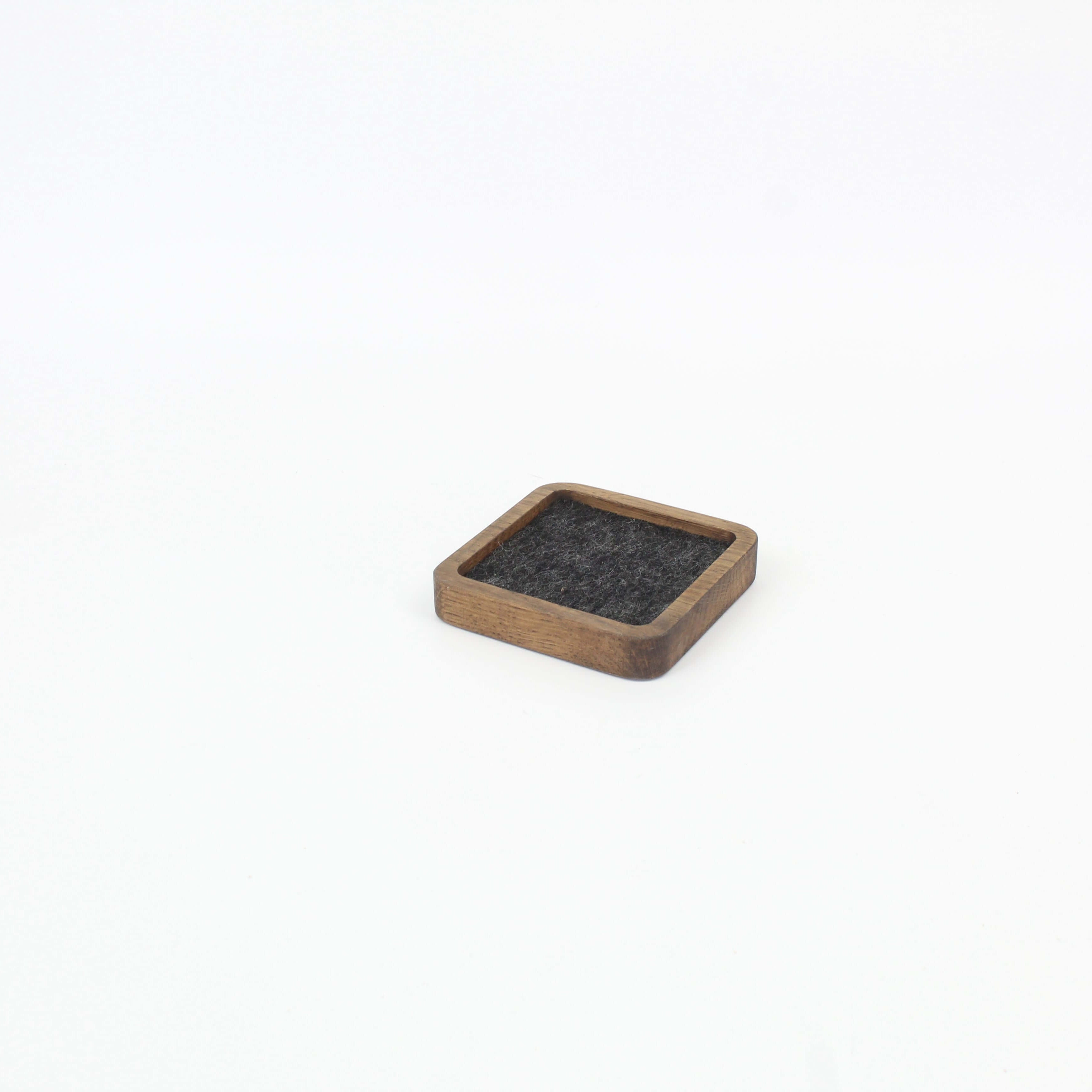 Small brown oak desk tray with felt lining, perfect for organizing small accessories as an EDC or valet tray.
