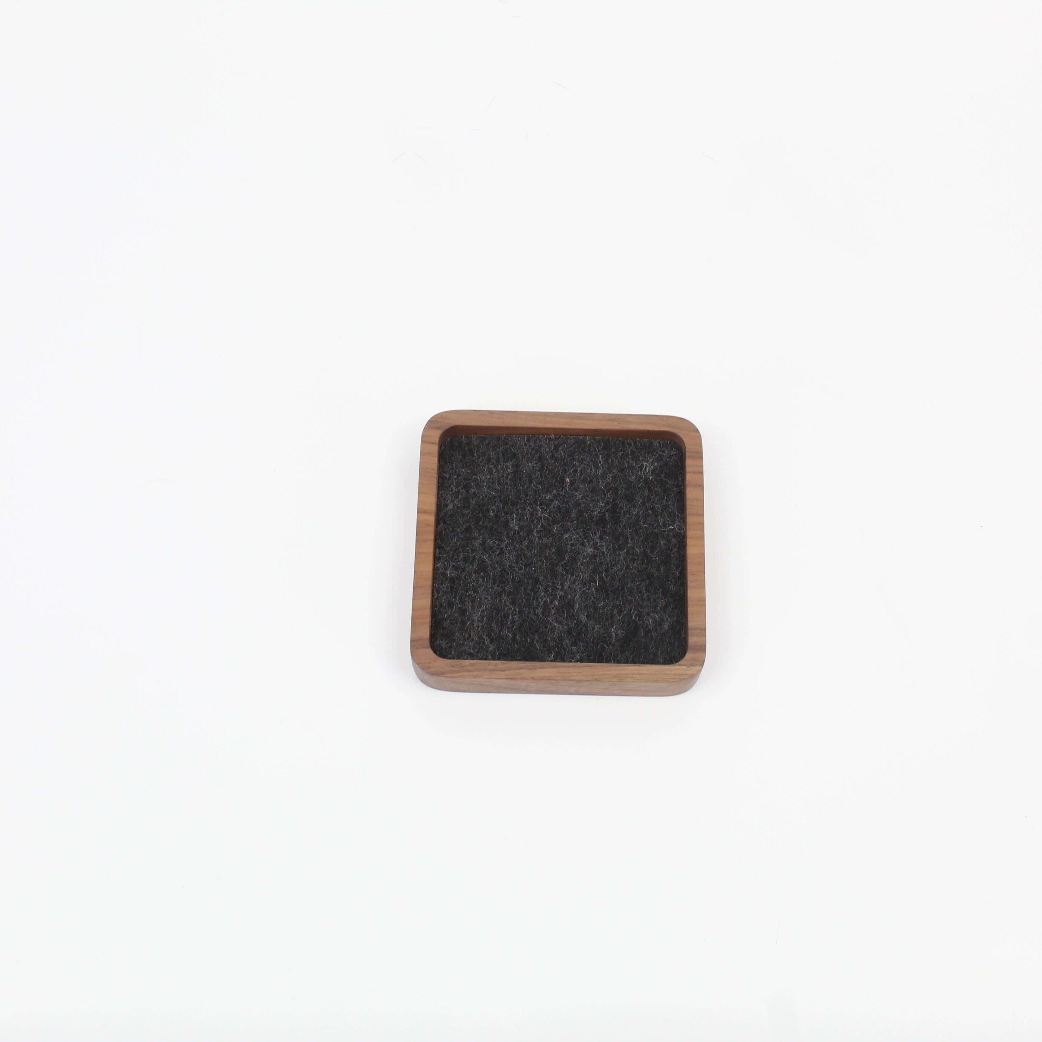 Small walnut desk tray with a felt interior, perfect for organizing accessories and as an elegant EDC valet tray.