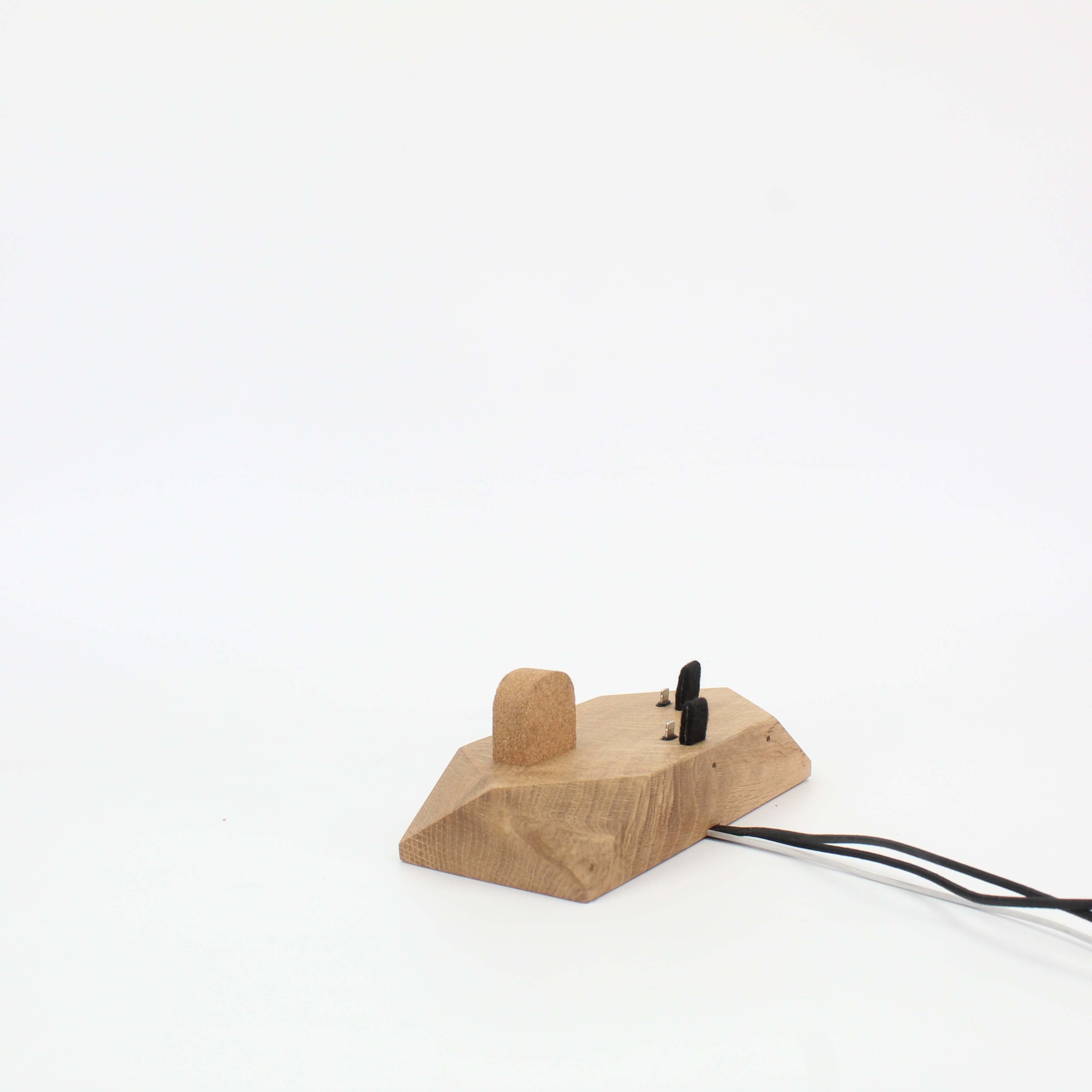 Oak Triple Docking Station with sleek design, accommodating smartphones and Apple Watch for organized charging.