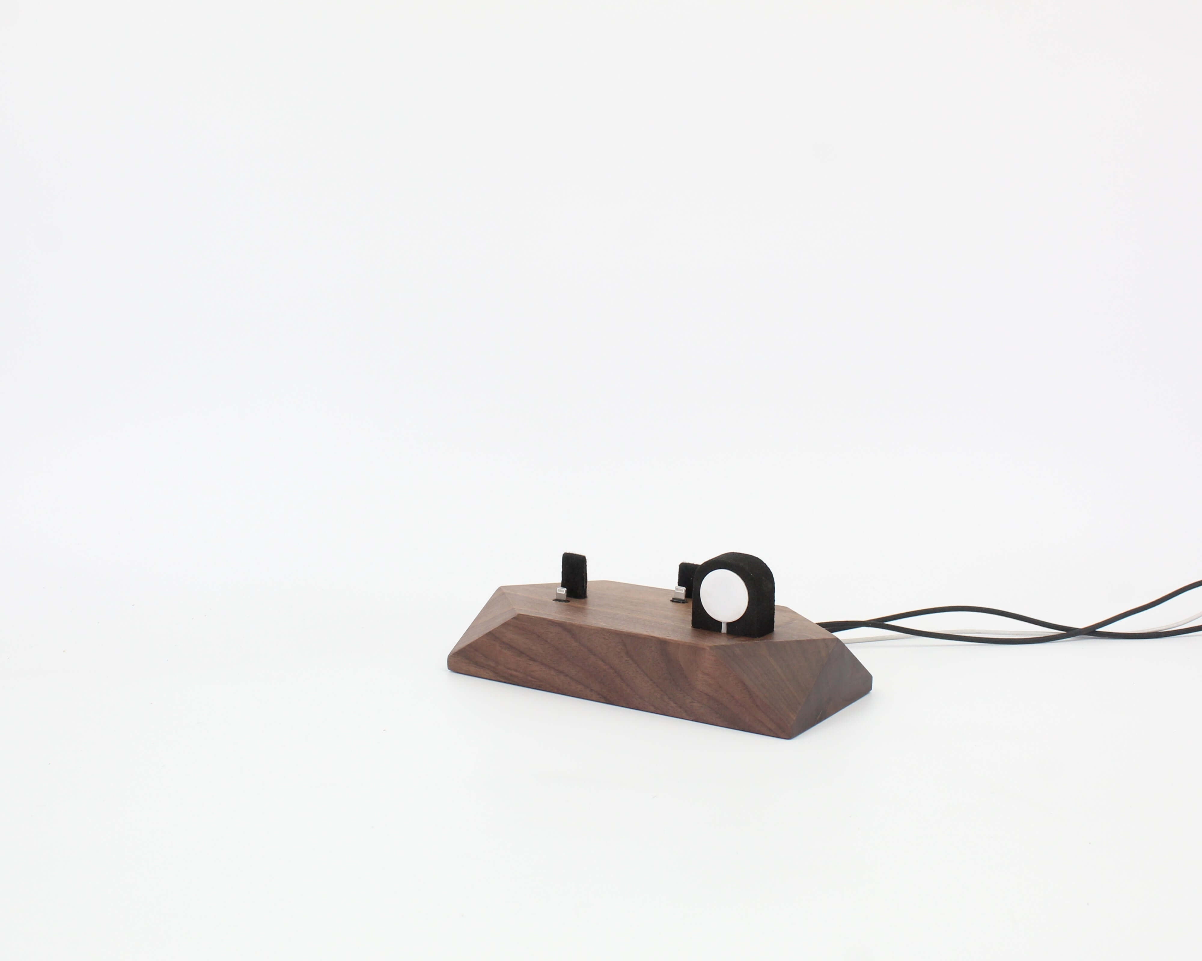 Triple Phone Dock in walnut finish for two smartphones and an Apple Watch, stylish workspace organization.