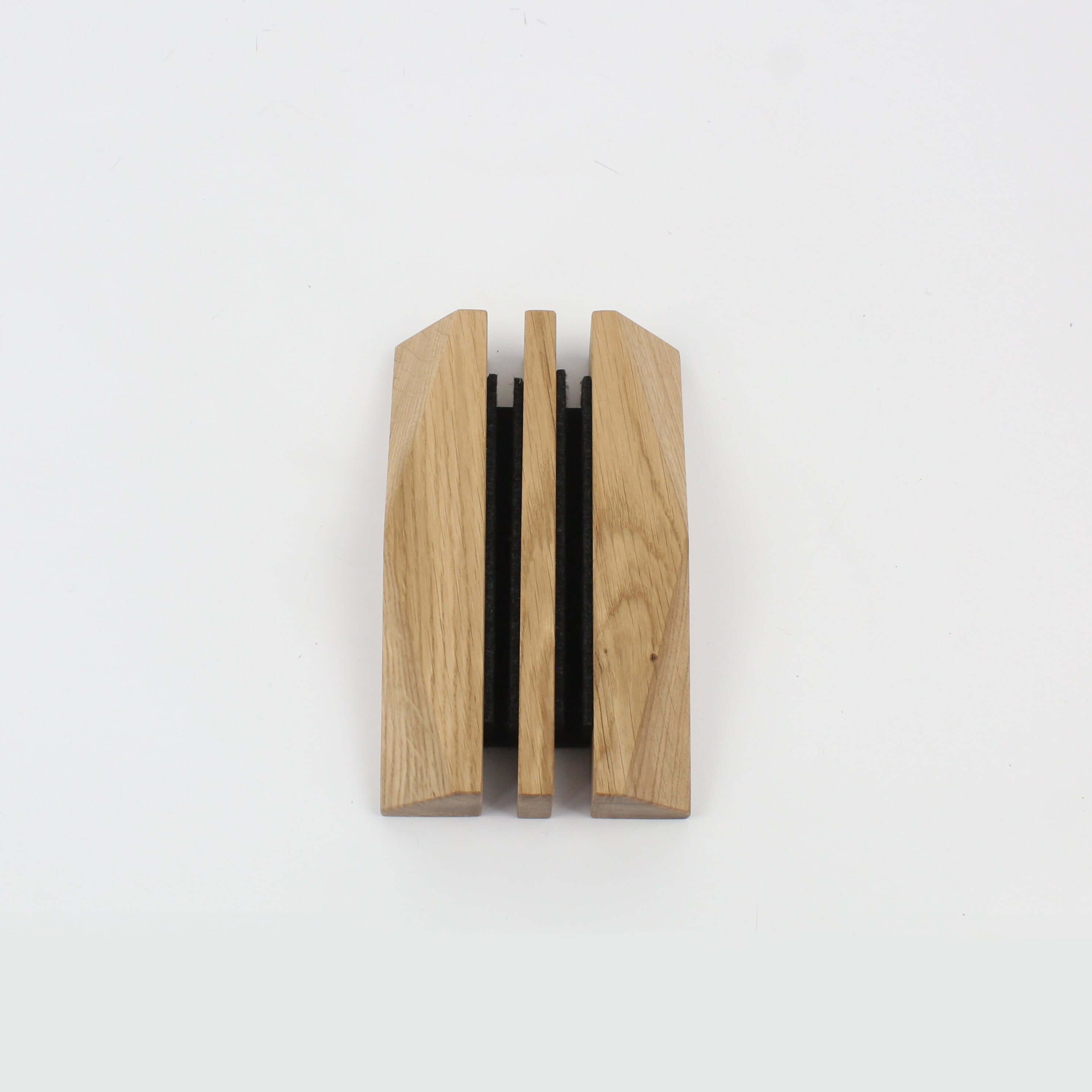 Dual laptop stand in oak, showcasing a sleek design for organizing multiple devices on a workspace.