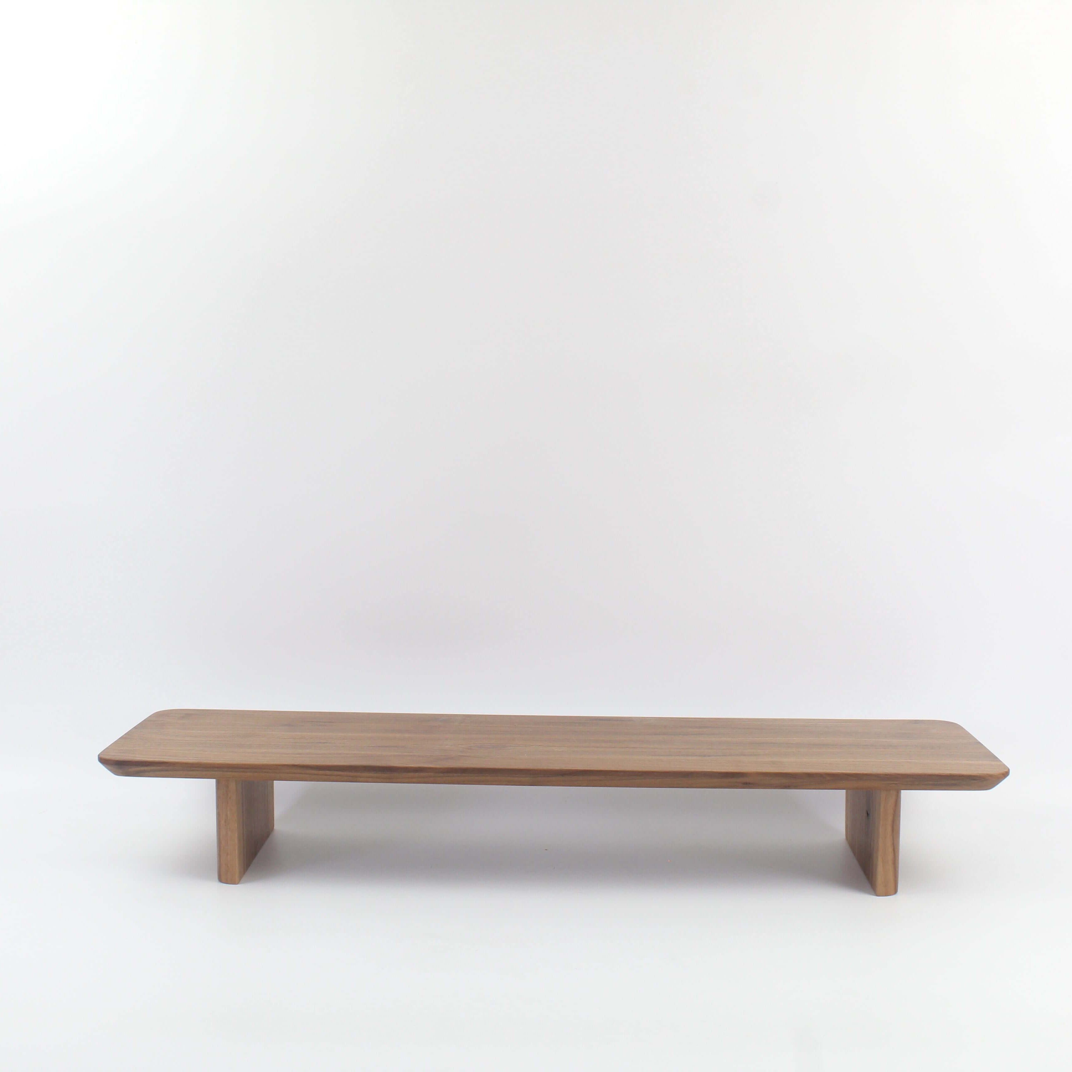 Walnut desk shelf, ideal wood monitor stand for workspace organization and enhanced storage.