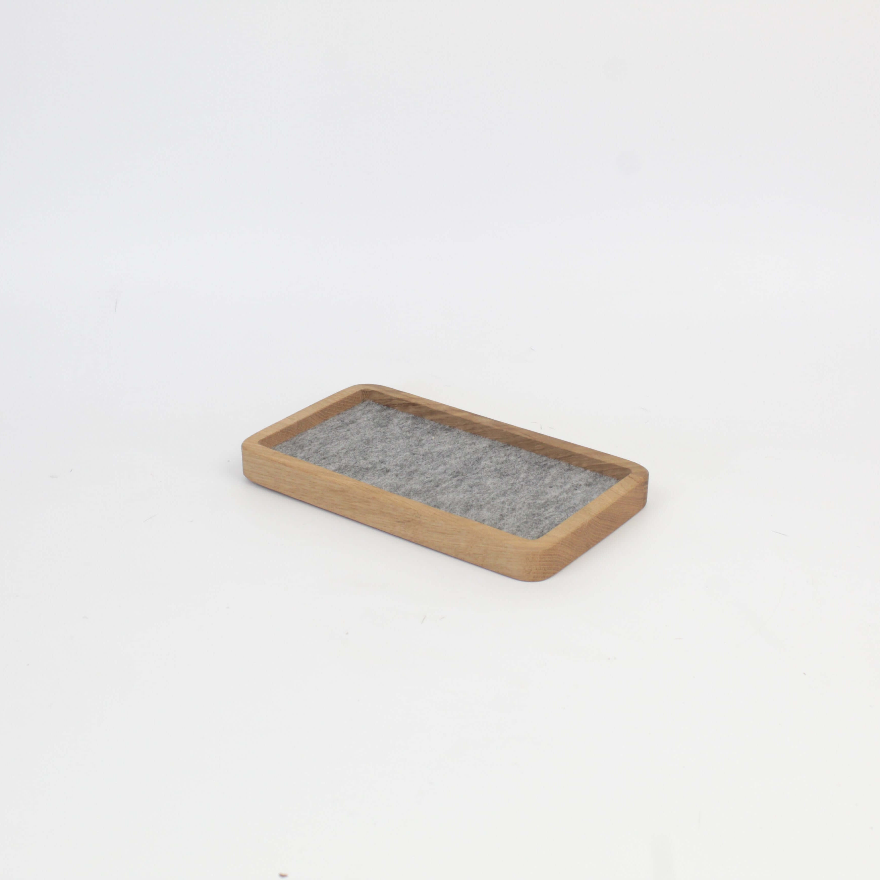 Catch All Tray - Oak Medium, a sleek wooden desk tray for organizing accessories and maintaining a tidy space.