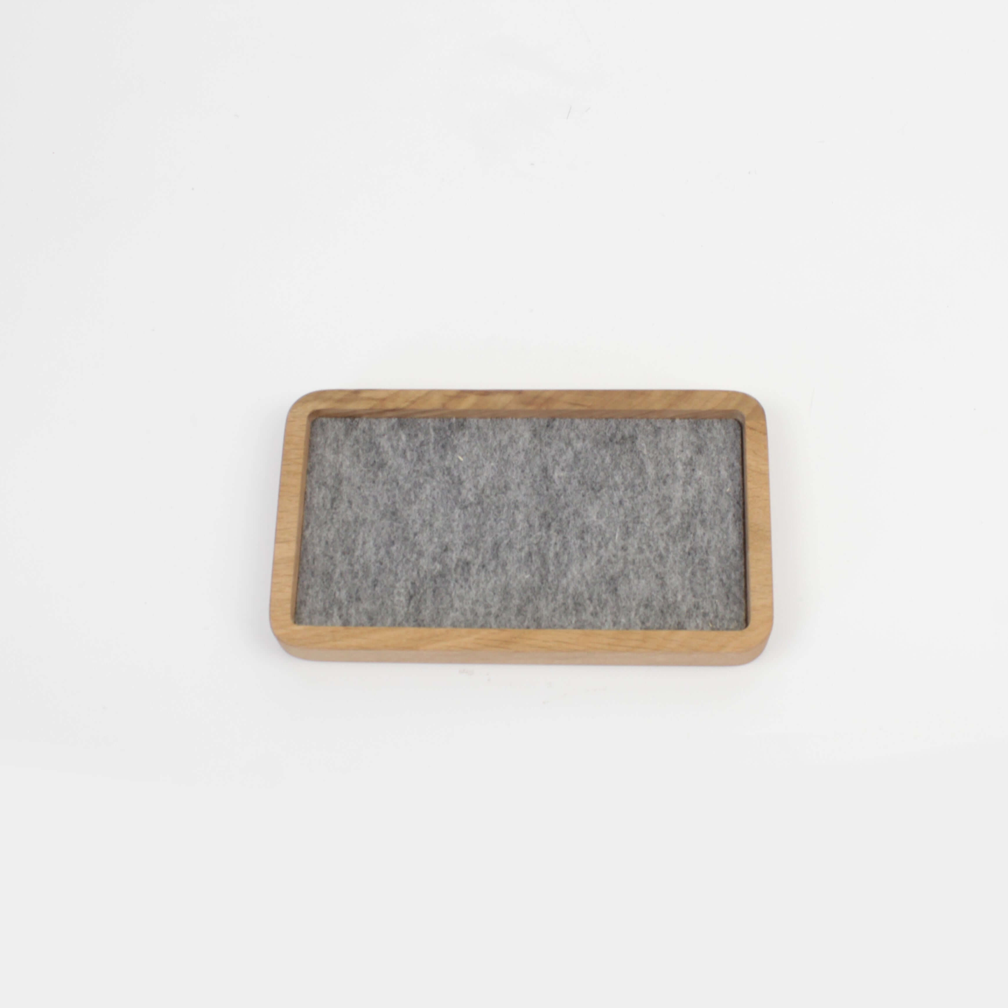 Catch All Tray in oak with gray felt interior, perfect for desk organization and small accessories.