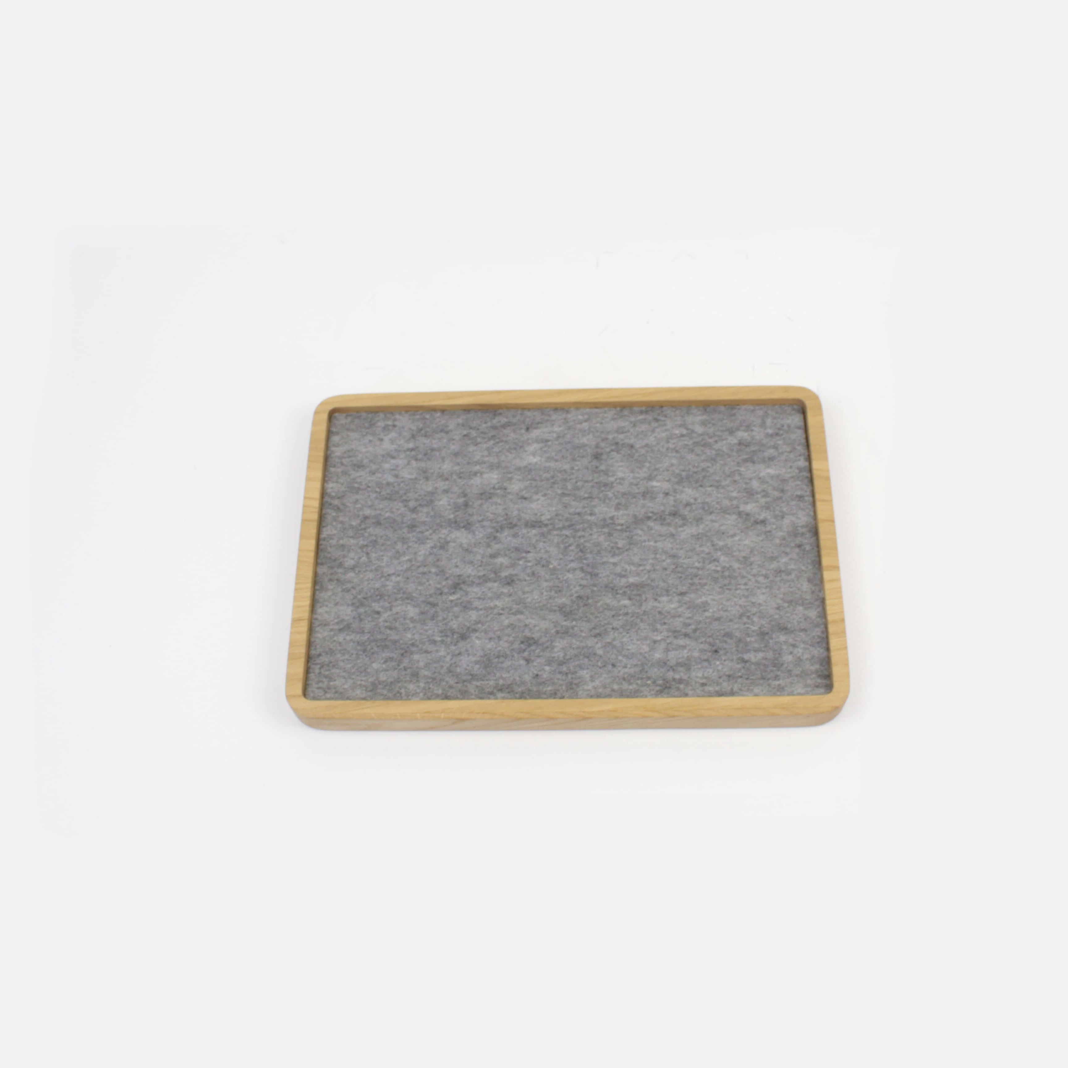 Large Catch All Tray in oak with a felt surface for organizing desk items and accessories.