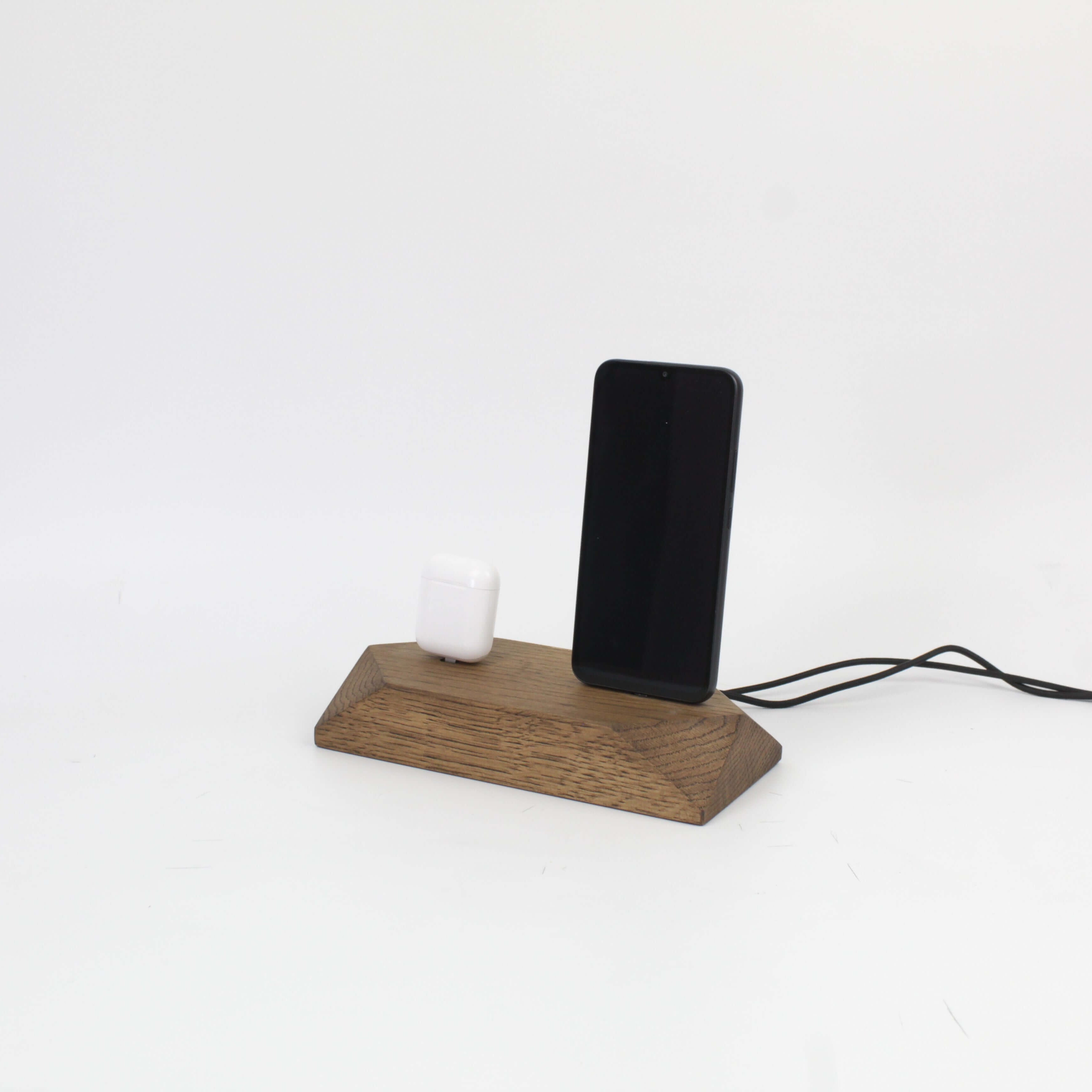 Dual Phone Dock in Brown Oak for iPhone and headphones, a stylish charging station to eliminate cable clutter.