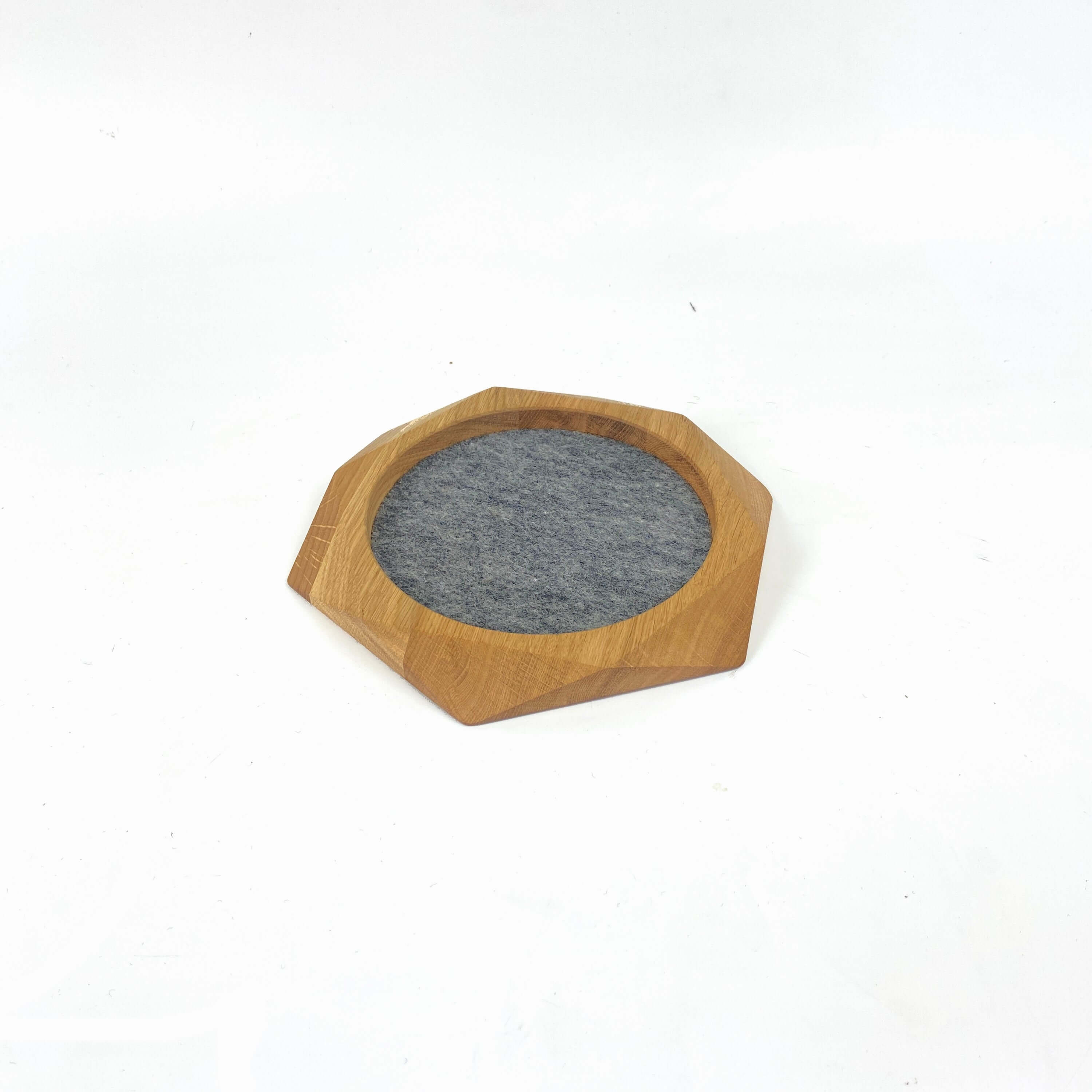 Geometric Wooden Tray made from oak with felt lining, ideal for organizing items and protecting surfaces.