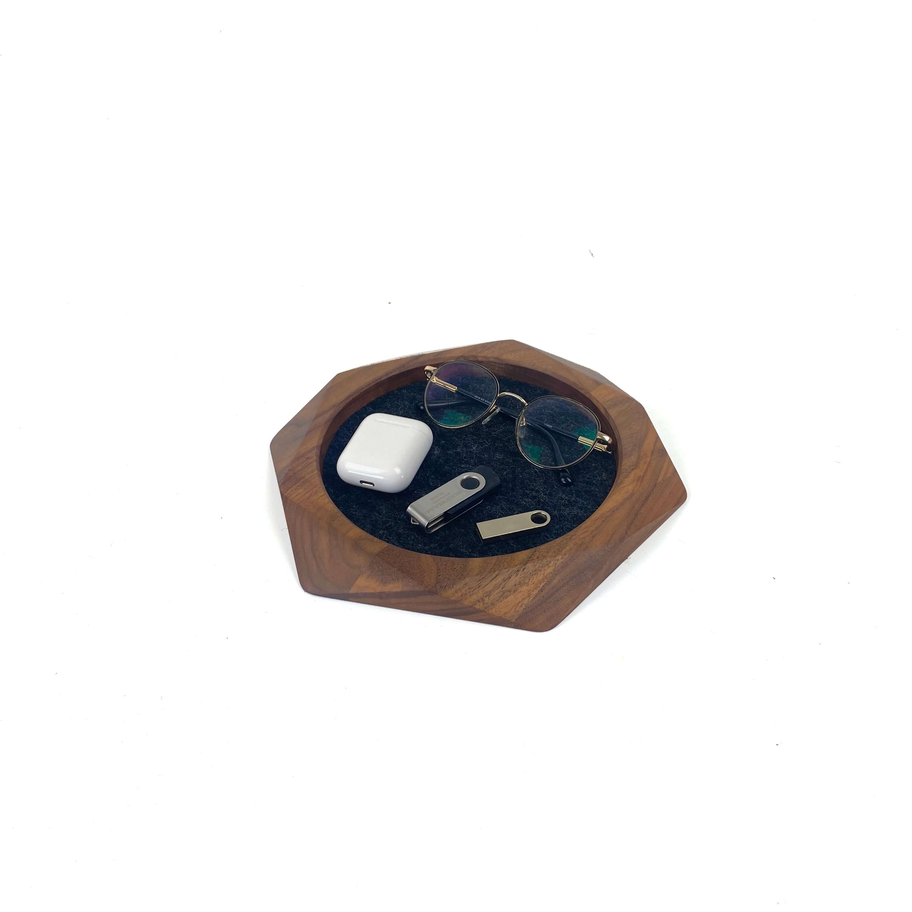 Geometric Wooden Tray in walnut holding glasses, AirPods, and accessories, perfect for organization.