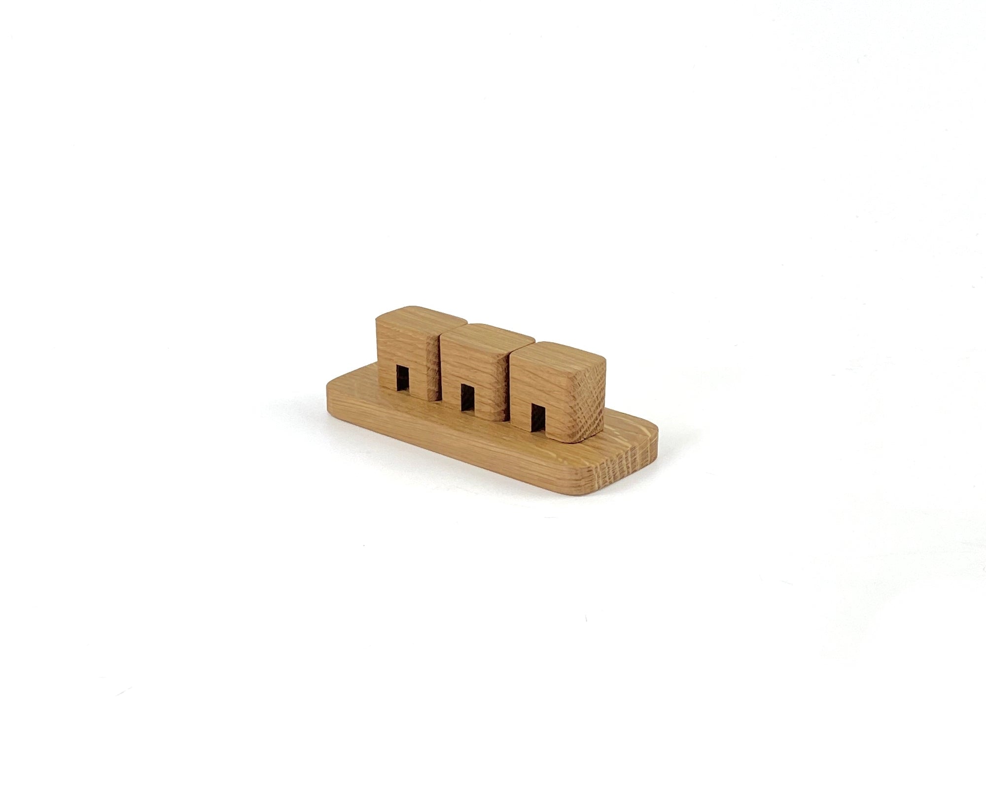 Cable Organizer - Oak, premium wooden desk accessory with three slots for neat cable management.