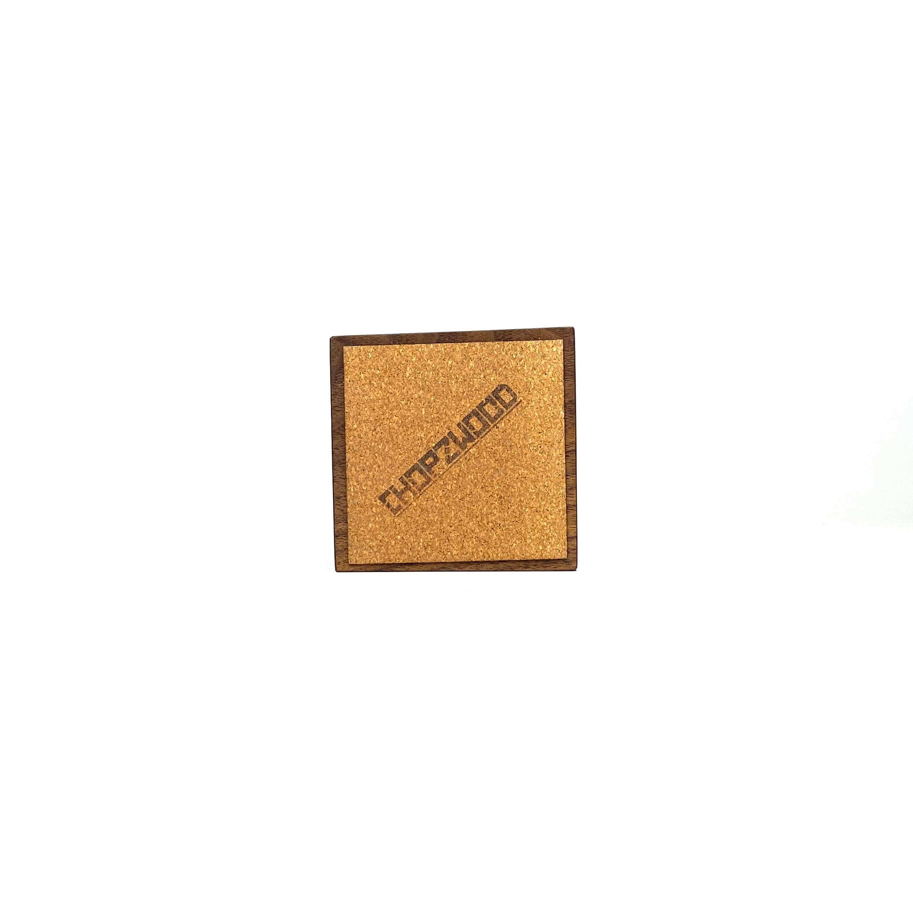 Wooden eyeglasses stand with a cork top, showcasing a stylish and functional design for organizing eyewear.