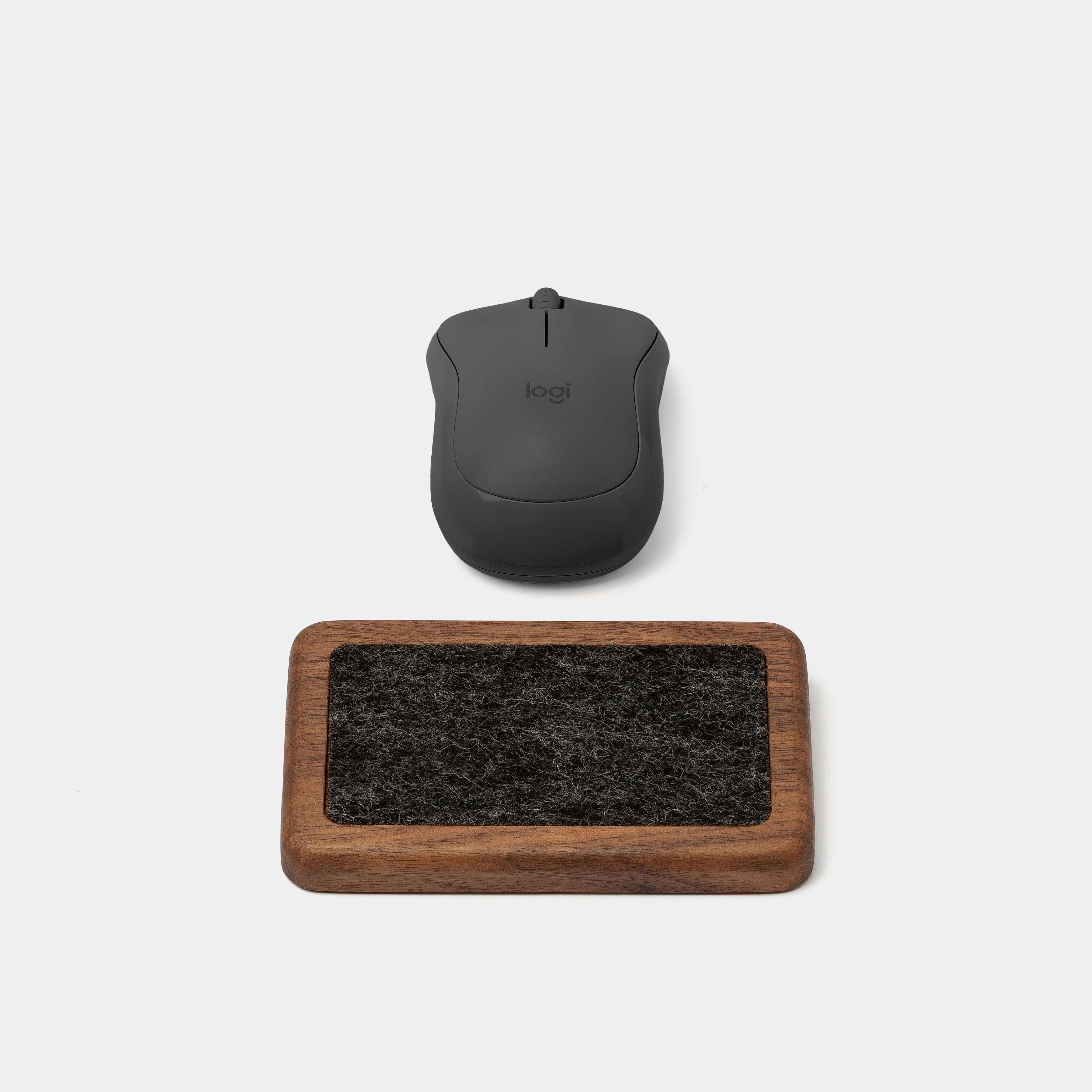 Mouse Wrist Rest - Walnut paired with a wireless mouse for ergonomic workspace comfort