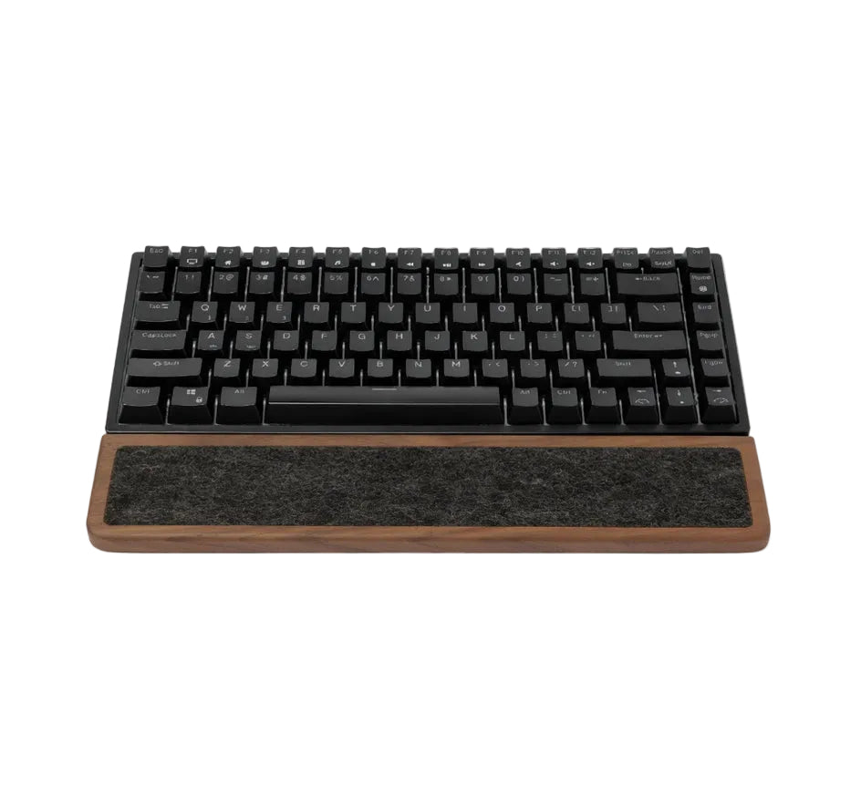 Keyboard Wrist Rest made of walnut wood with black mechanical keyboard on top, providing ergonomic support.