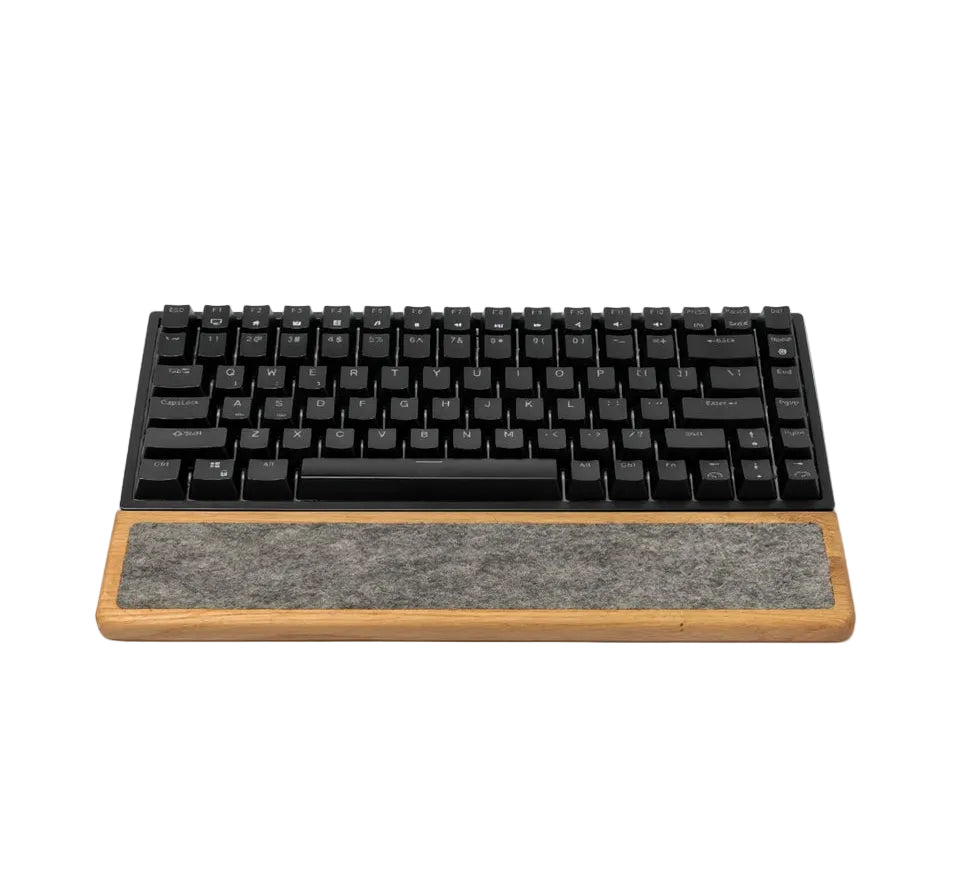 Keyboard Wrist Rest made of oak wood paired with a black mechanical keyboard for ergonomic typing support.