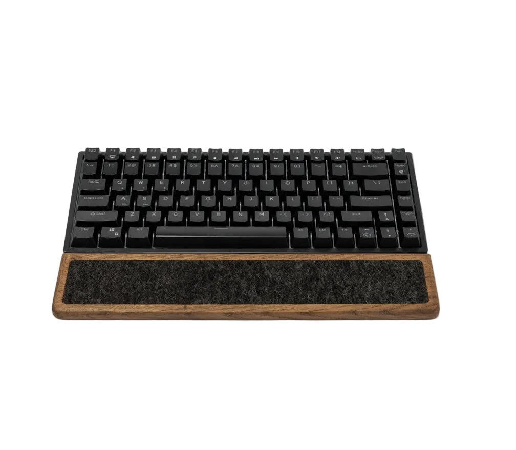 Keyboard Wrist Rest - Brown Oak positioned under a black mechanical keyboard, offering ergonomic support.