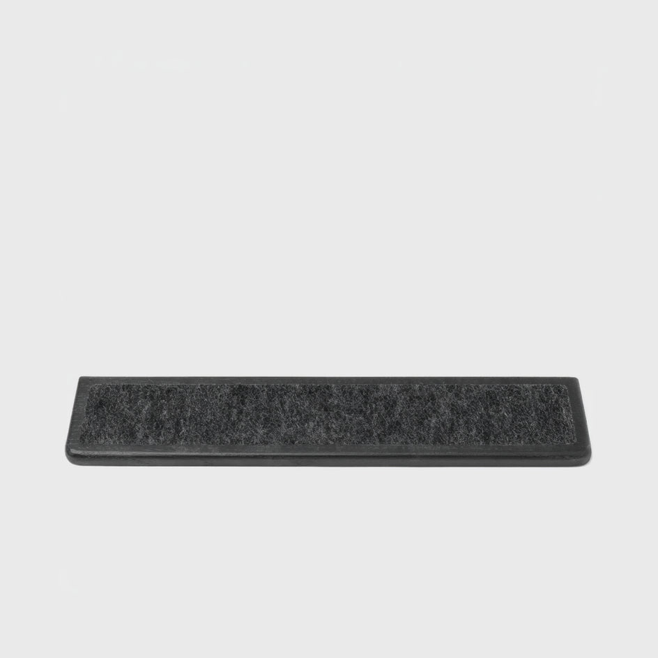 Keyboard Wrist Rest - Black Oak with a smooth surface for ergonomic support during typing.