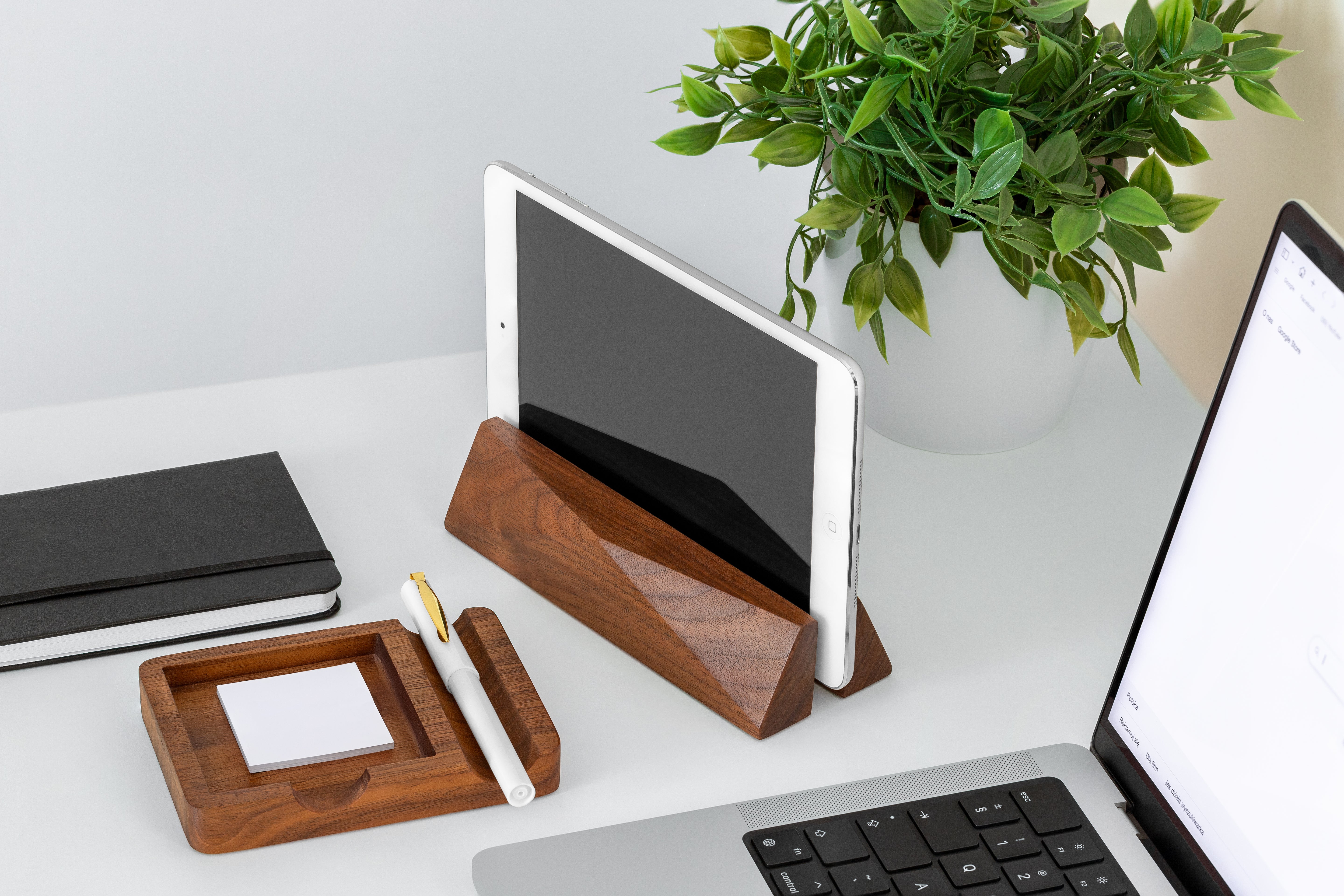 Elegant Laptop Dock in walnut, complementing a clean workspace with an iPad and stationery essentials.