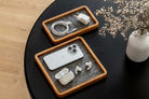 Catch All Tray - Walnut - Square organizing technology essentials like AirPods and chargers on a desk.