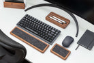 Keyboard wrist rest set in walnut combined with keyboard and mouse for ergonomic comfort on a workspace.