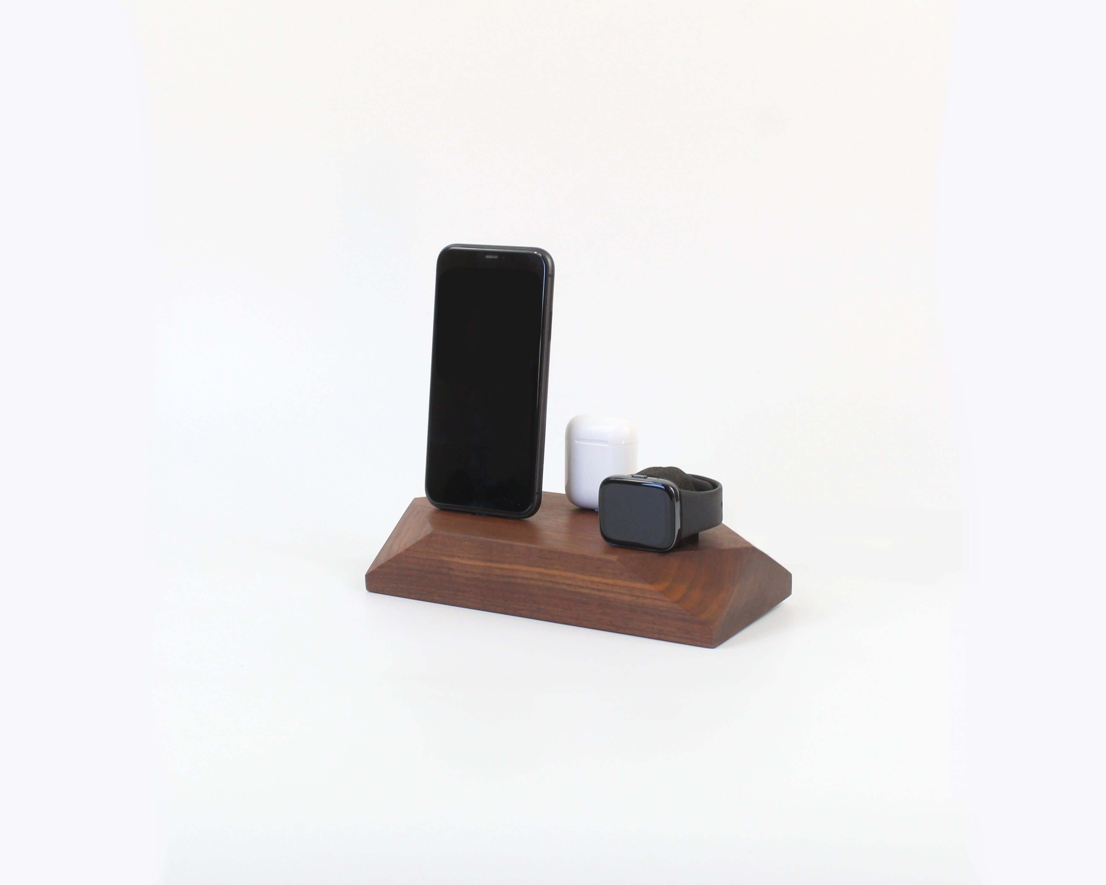 Triple Phone Dock in walnut wood design with space for two smartphones and an Apple Watch.