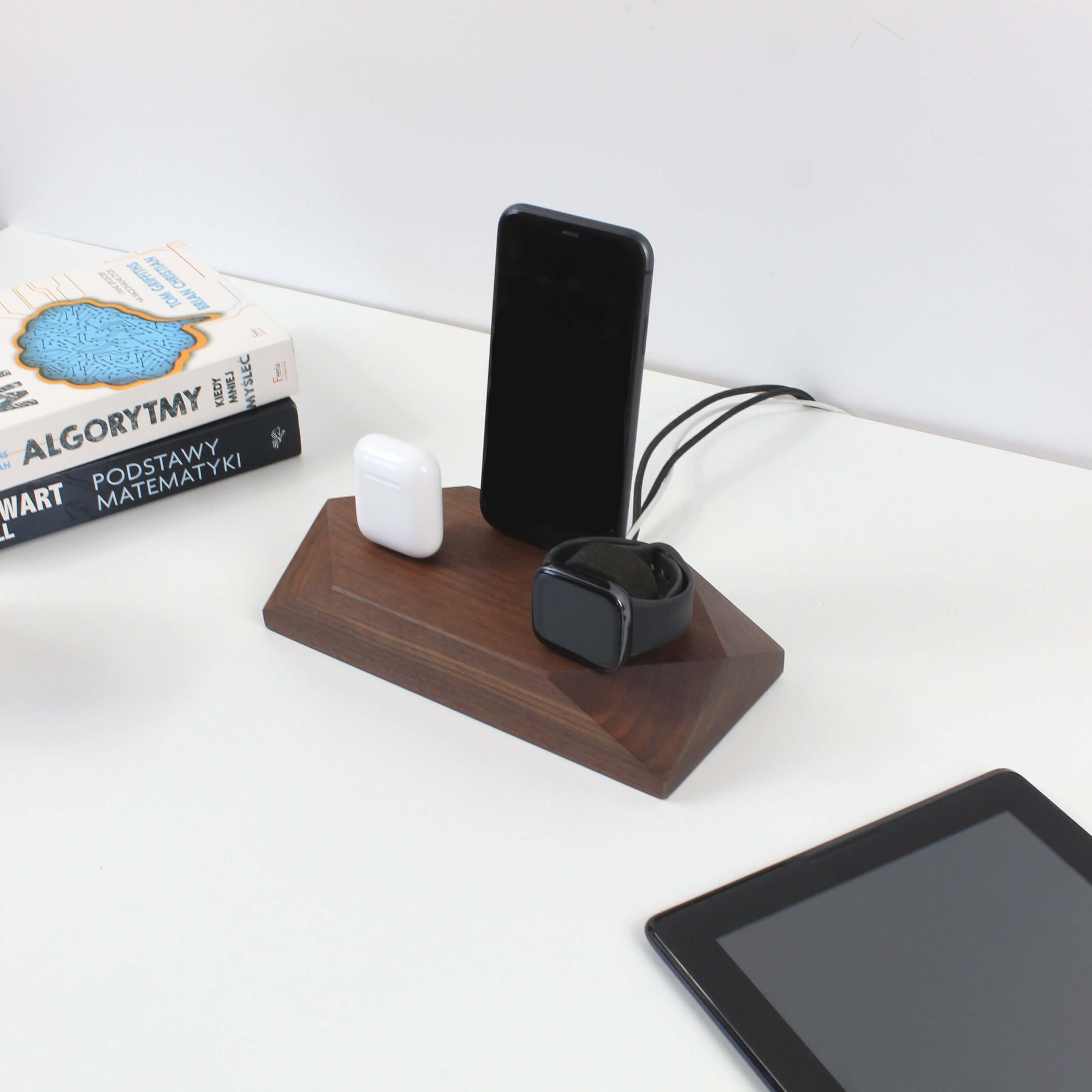 Triple Dock Walnut charging station for phones and Apple Watch, organized workspace with sleek design and functionality.