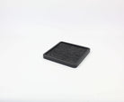 Black oak square catch all tray for organizing desk accessories and essentials, ideal for a tidy workspace.