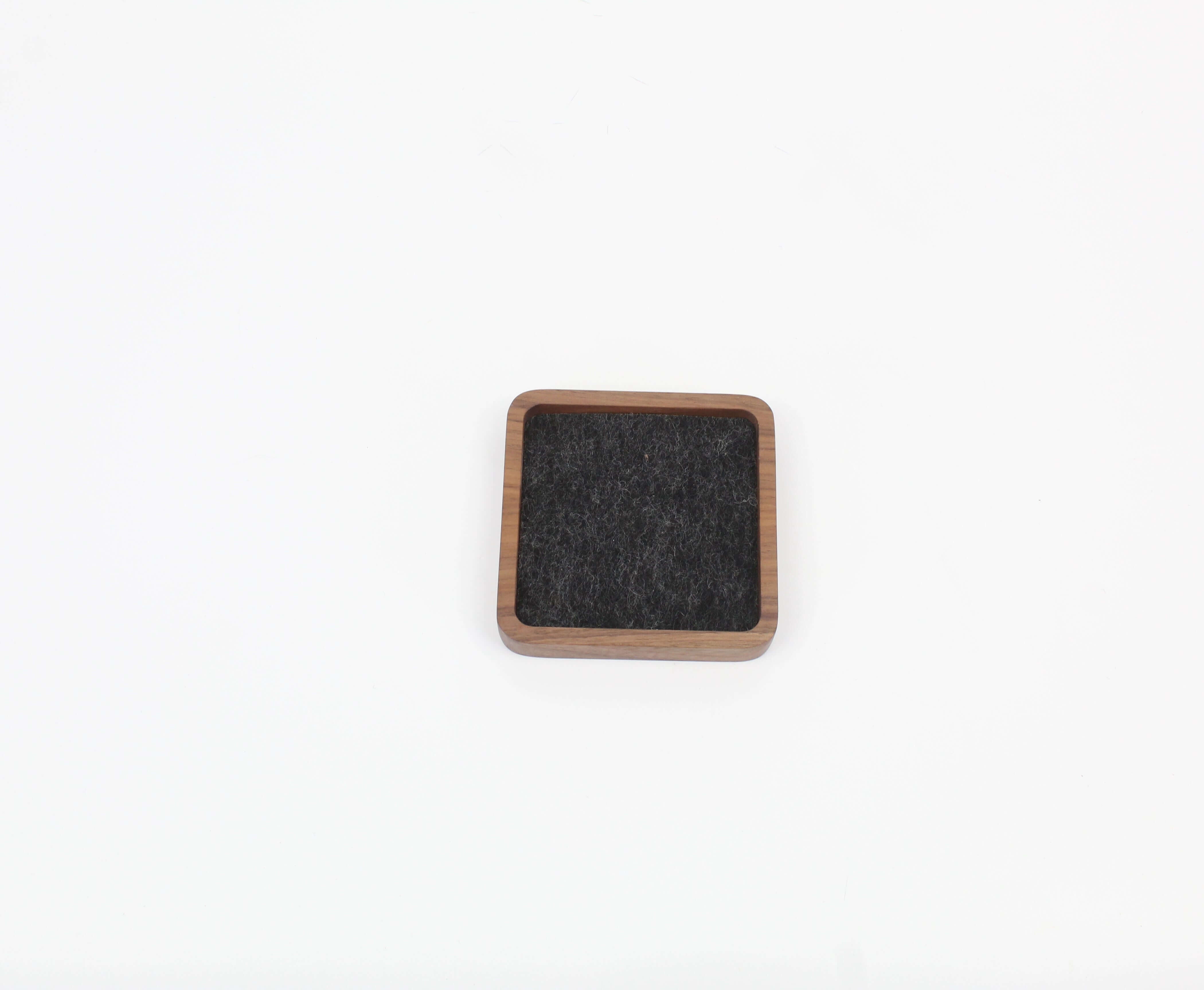 Small walnut desk tray with a felt interior, perfect for organizing accessories and as an elegant EDC valet tray.