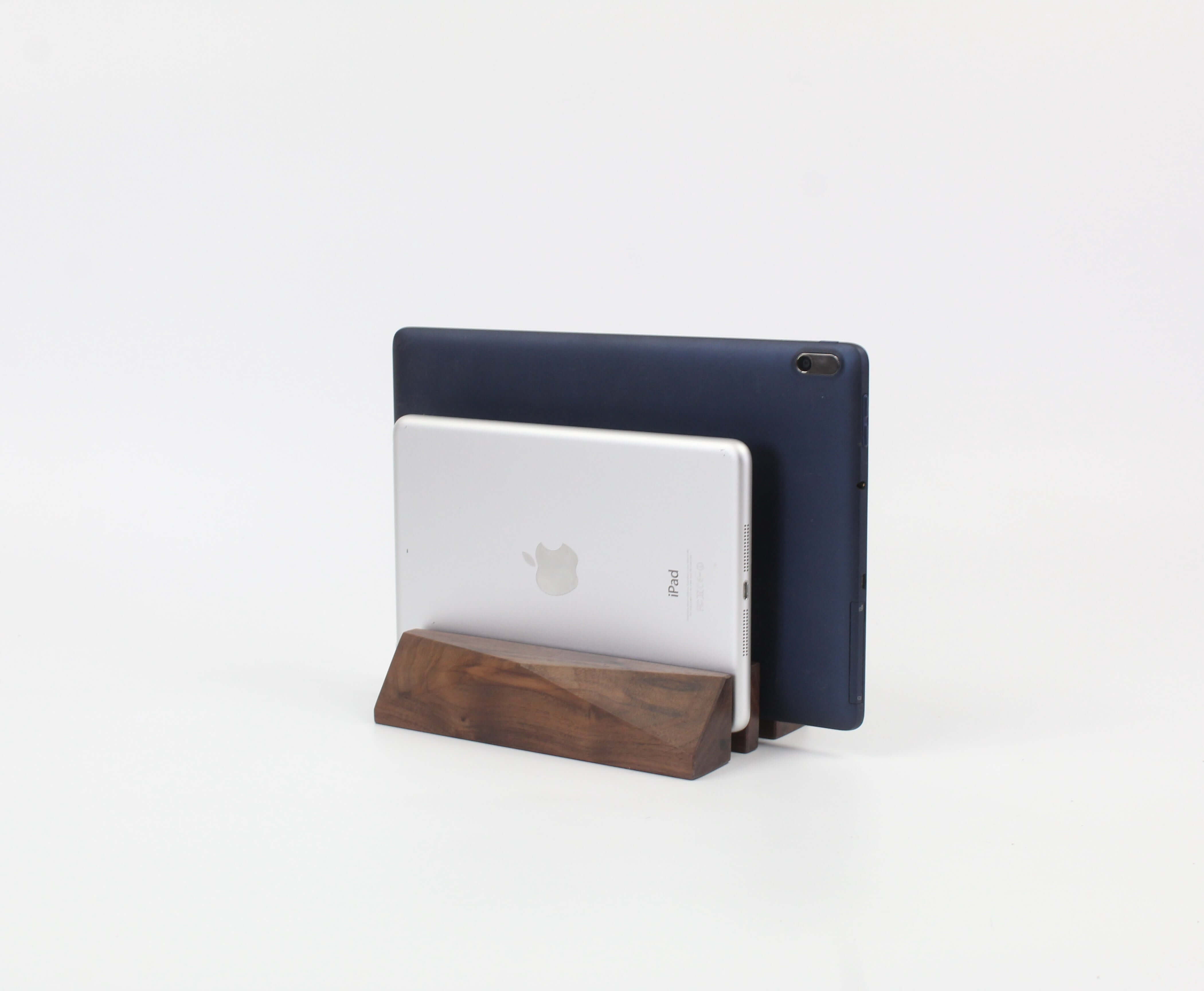 Dual laptop stand in walnut holding two devices, perfect as a desk organizer and stylish laptop accessory.