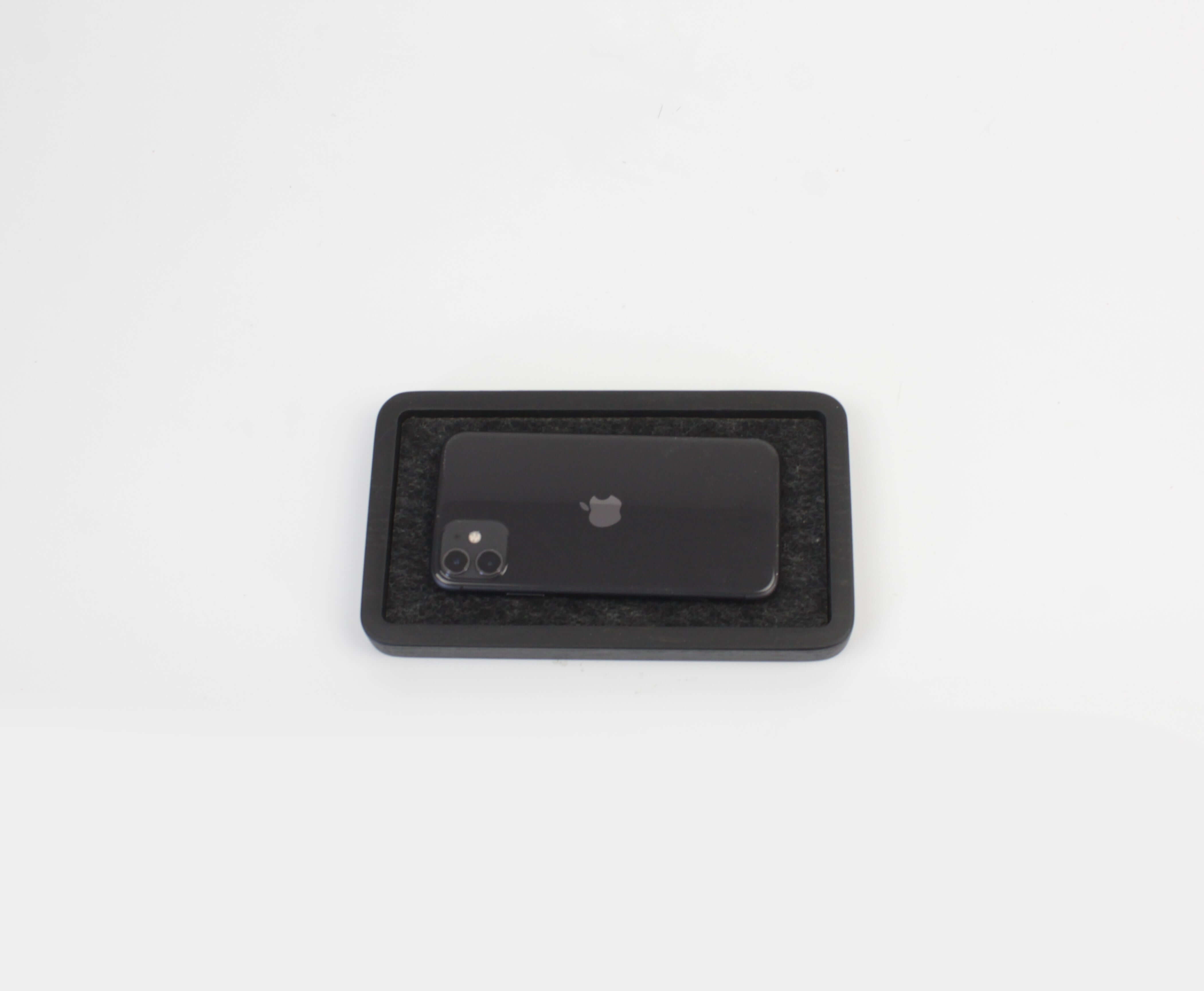 Catch All Tray in Black Oak with phone, perfect for organizing EDC items and maintaining a clutter-free space.