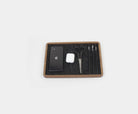 Catch All Tray in walnut with phone, AirPods, scissors, and pens for desk organization.