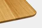 Close-up of a Wooden Table Top showcasing its natural grain and smooth edges.