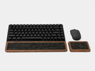 Keyboard wrist rest set in walnut color with matching mouse support for ergonomic workspace comfort.
