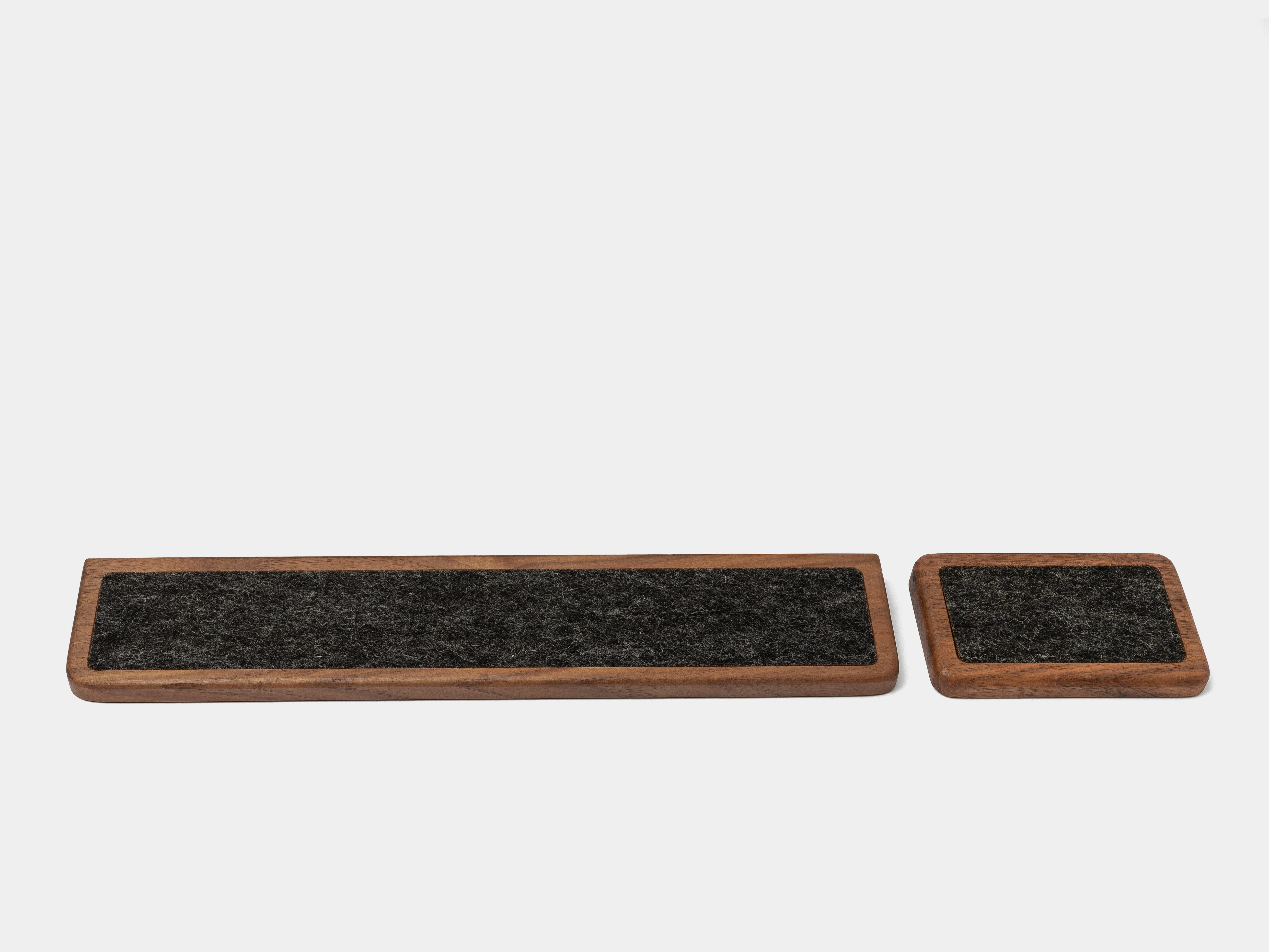 Keyboard wrist rest set in walnut, featuring ergonomic design for wrist support while typing and using a mouse.