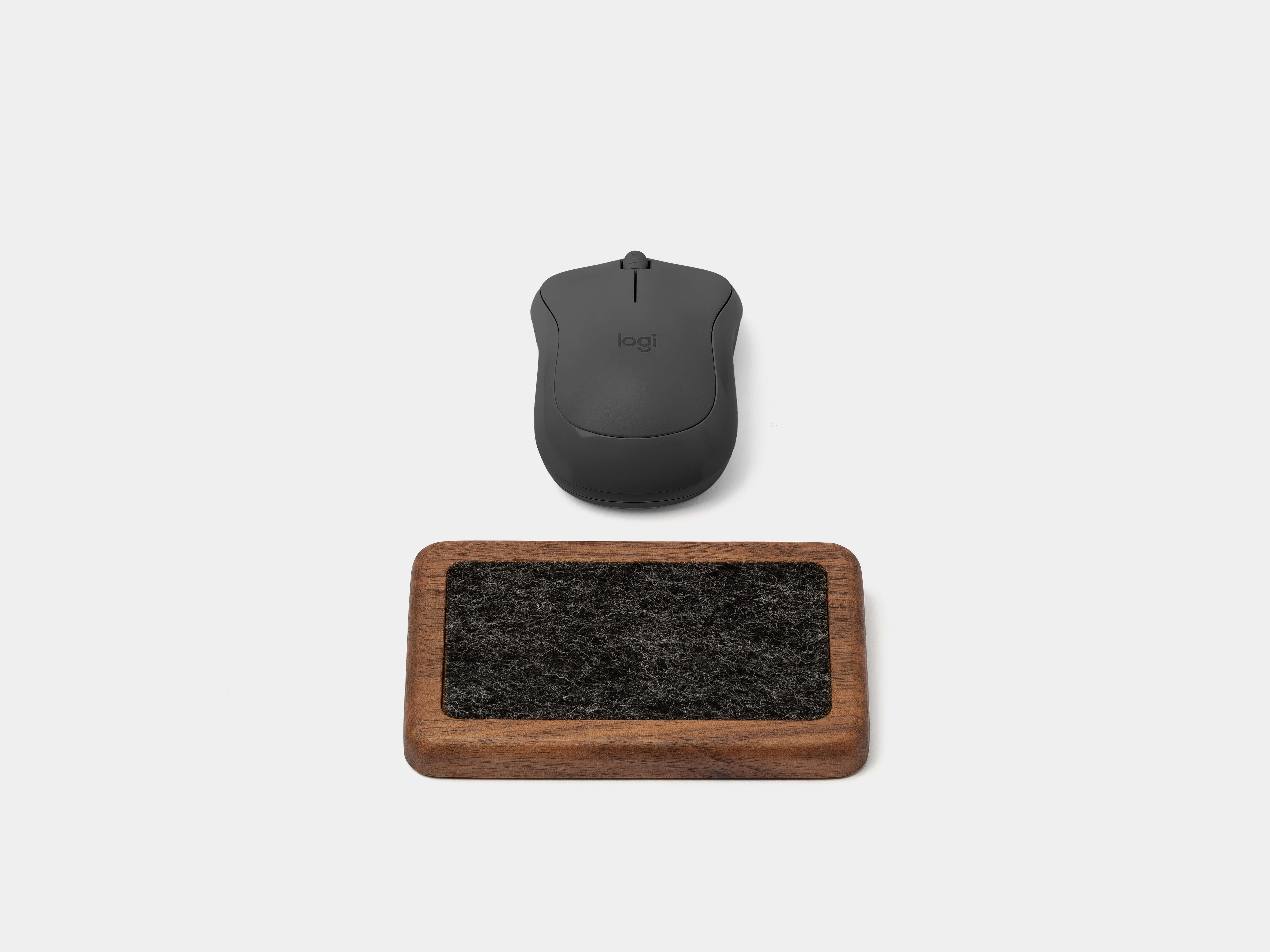 Mouse Wrist Rest - Walnut paired with a wireless mouse for ergonomic workspace comfort