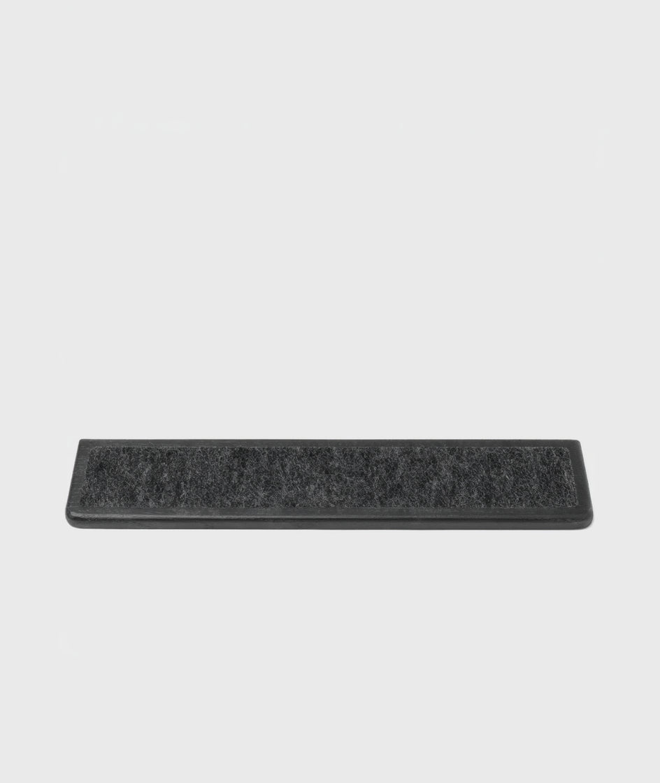 Keyboard Wrist Rest - Black Oak with a smooth surface for ergonomic support during typing.