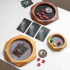 Geometric Wooden Tray - Walnut displaying cards, dice, and game accessories in a stylish tabletop setup.