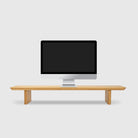 Desk Shelf - Oak with a computer monitor on top, designed for workspace organization and efficiency.