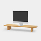 Desk Shelf showcasing a modern oak design under a computer monitor for workspace organization.